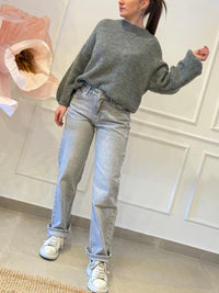 Jeans tasca con fiocco